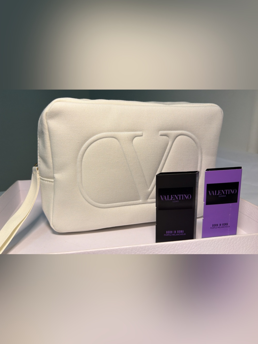 New,unused Large Valentino beauty Embossed Logo Wrist Pouch and two samples